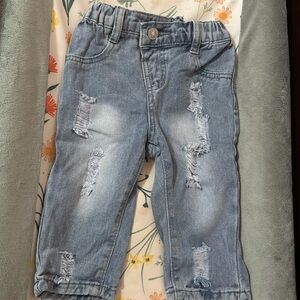 Distressed baby jeans